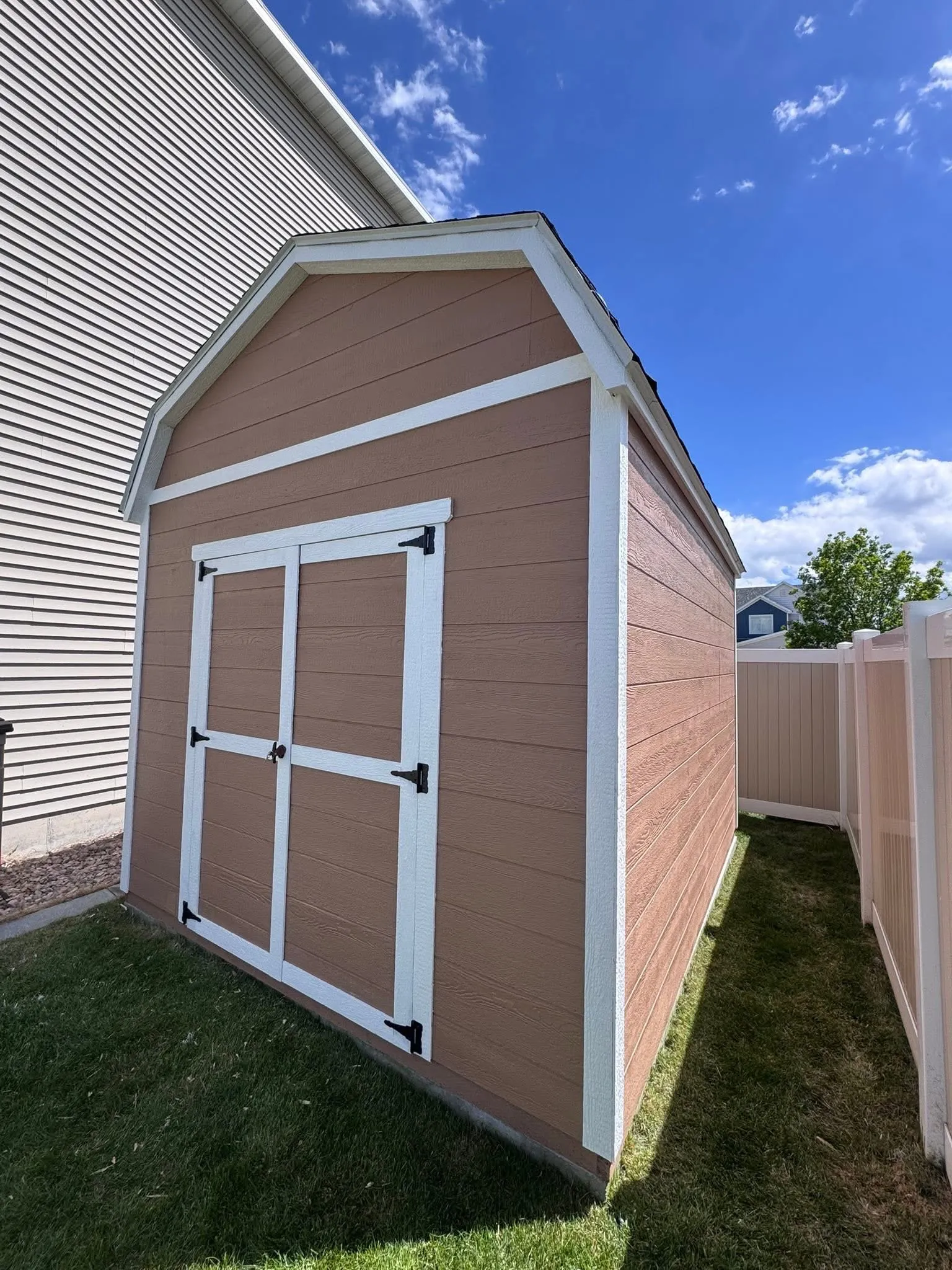 Brown gambrel shed Logan Utah