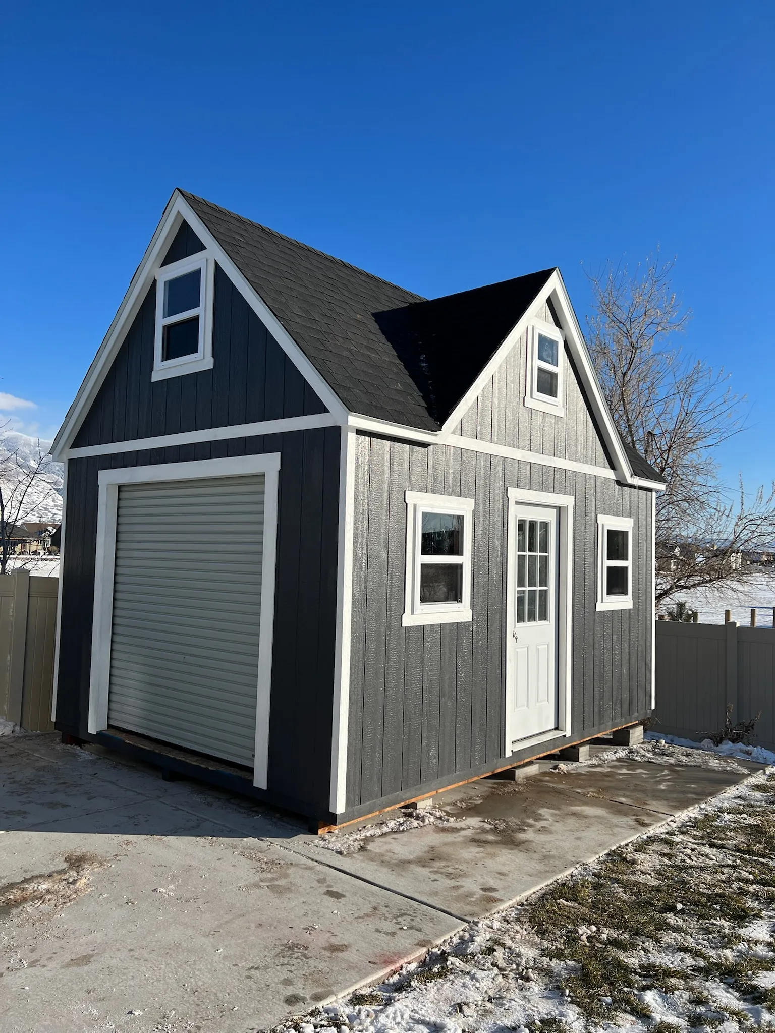 Dark gray 3-Peak 4-Peak shed built by ShedPro LLC Utah